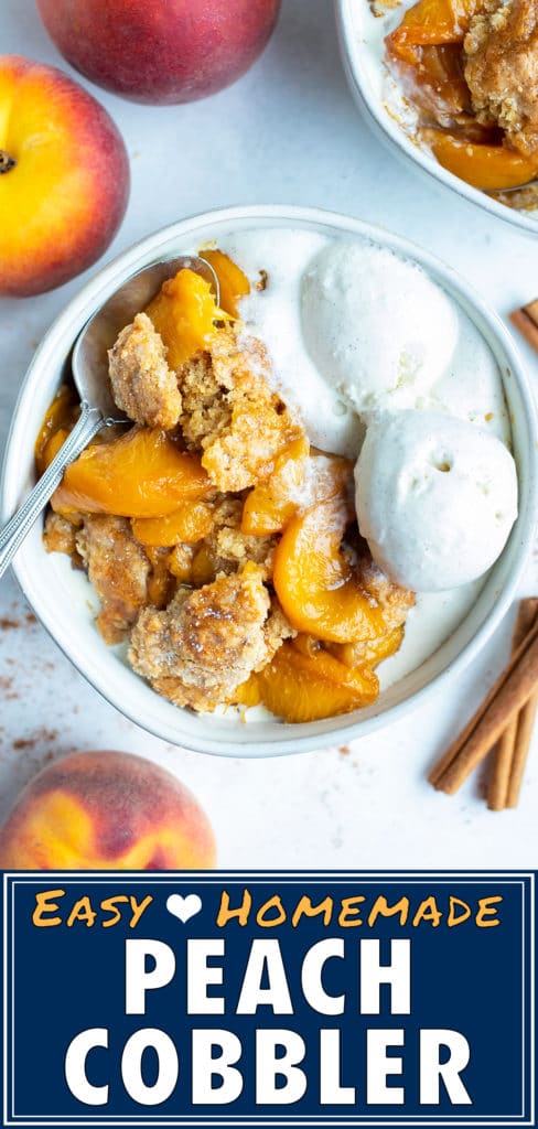 Peach cobbler is in a bowl on the counter and topped with melting, vanilla ice-cream for an easy dessert.