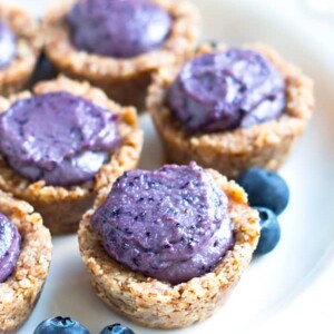 Gluten-free Healthy Blueberry Tarts on a white plate for a healthy treat.