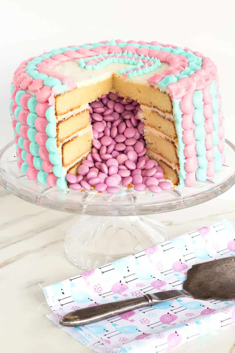 Gender Reveal Cake | An exciting gender reveal cake that is full of a surprise -- M&M's revealing the gender of the baby!