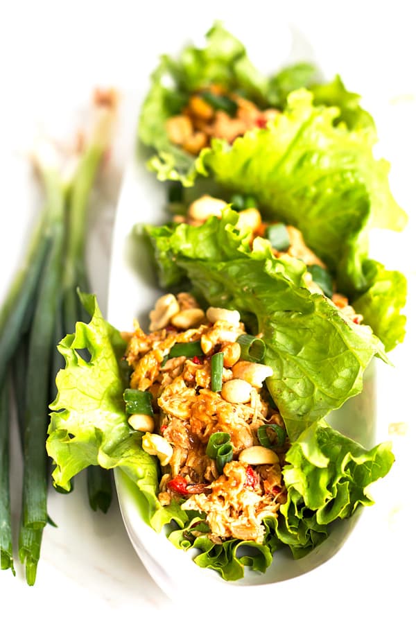 Peanut Asian Chicken Lettuce Wraps are a healthy gluten-free, low-carb and Paleo lunch or dinner recipe that does not require any cooking to whip up!