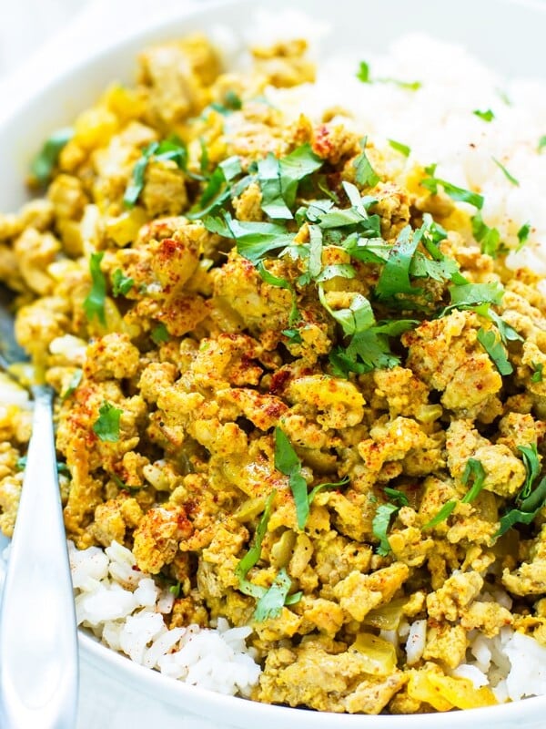 A gluten-free ground turkey recipe with rice filling a white bowl for a healthy lunch.