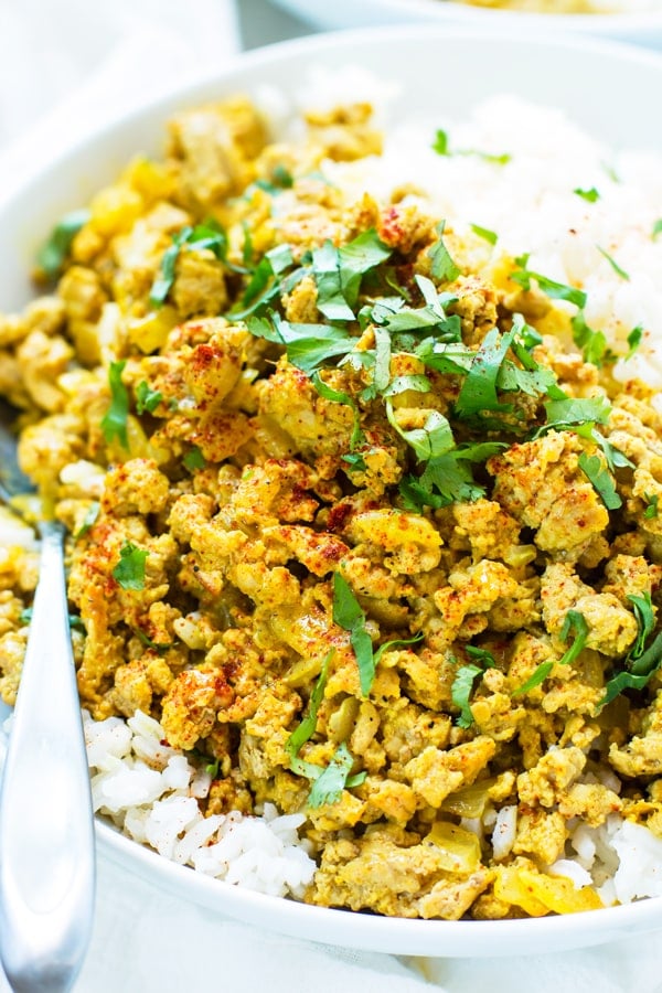 A gluten-free ground turkey recipe with rice filling a white bowl for a healthy lunch.