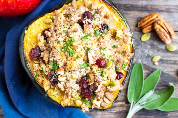 Stuffed acorn squash full of cranberries, pecans, ground turkey, and pumpkin seeds.