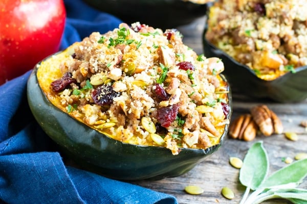 Ground turkey stuffed acorn squash with pecans, sage, pumpkin seeds, and apple.