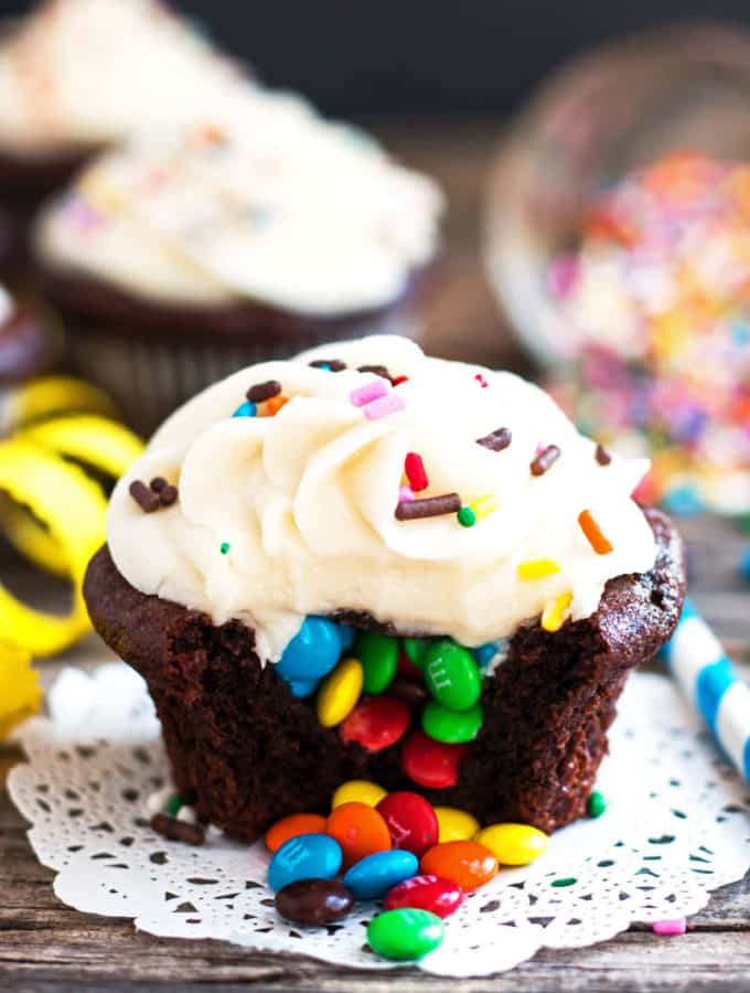 Surprise M&M Cupcakes | A gluten free and kid-friendly cupcake recipe that is loaded with M&Ms.