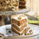 A Gluten Free Classic Carrot Cake Recipe | A spring or summer gluten free cake recipe that is full of carrots, walnuts and topped with a yummy cream cheese frosting!