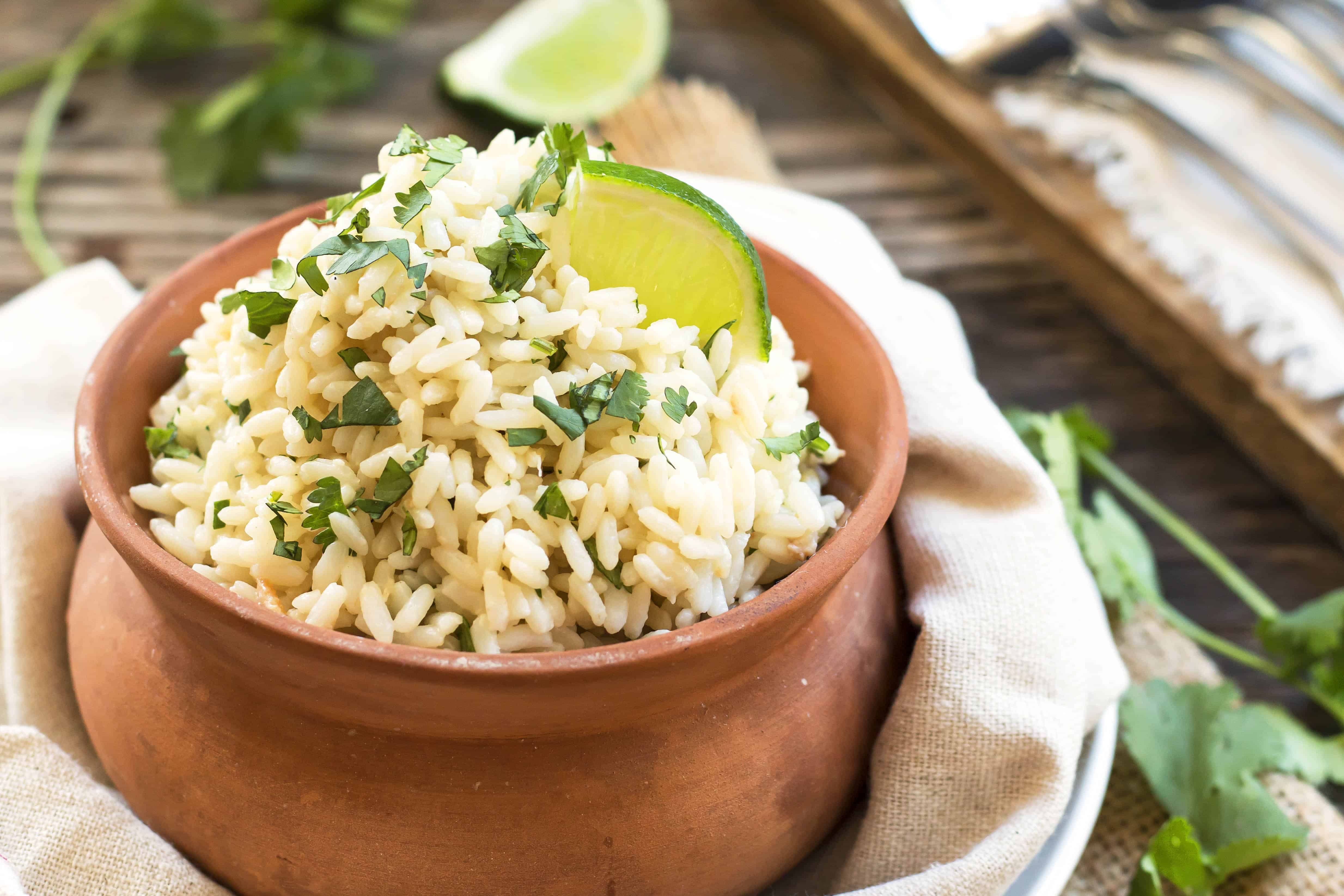 Coconut Cilantro Lime Brown Rice with cilantro as a garnish for an easy side dish.