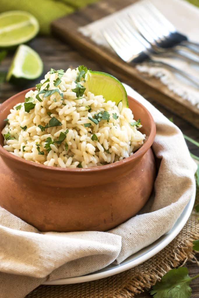 A bowl with gluten-free cilantro lime brown rice with coconut for an easy dinner.