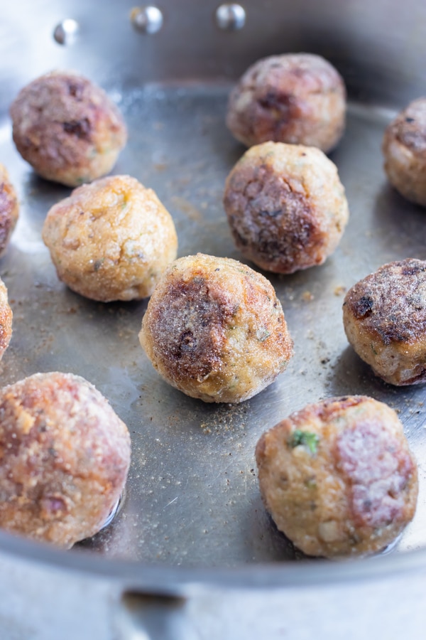 Turkey meatball recipe can be cooked in the oven or seared on a skillet for the perfect crisp texture.