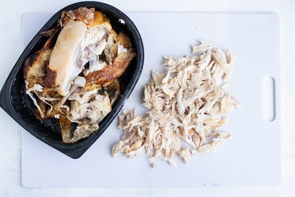 A rotisserie chicken that has been shredded.