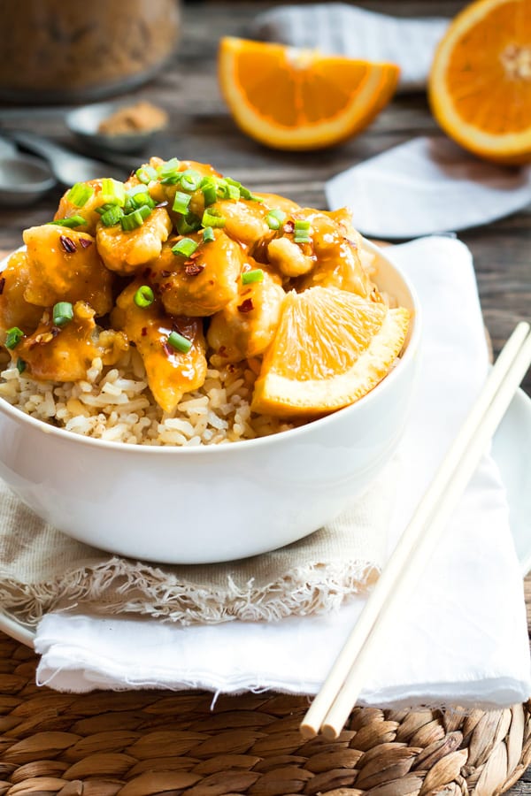 A healthy orange chicken recipe in a bowl with rice for a quick dinner.