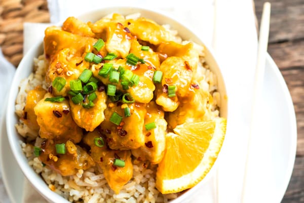 Healthy, gluten-free orange chicken in a bowl with rice for a healthy dinner.