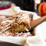 Gluten Free Apple Coffee Cake with Pecans | A gluten free coffee cake that is bursting with fresh apple flavor, cinnamon, and finished with a crumb topping and creamy glaze!