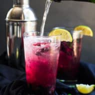 A blueberry champagne cocktail that is full of fresh lime juice, mint, and rum. It makes a wonderful party drink for birthday parties, holiday parties, New Year's Ever or any special occasion.
