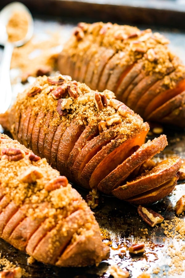 A collection of a gluten-free Thanksgiving sweet potato recipe on a baking sheet for the holidays.