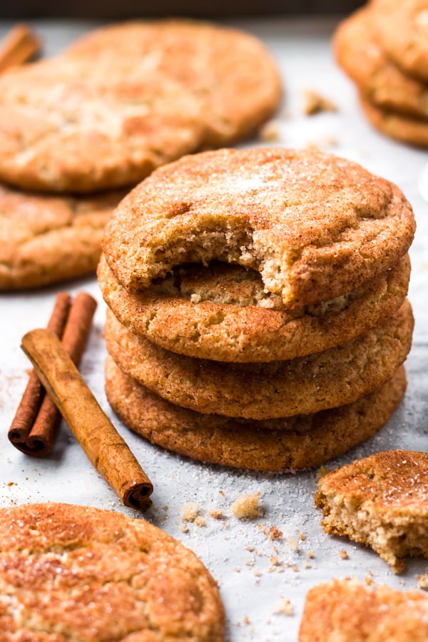 Gluten free snickerdoodles that are melt-in-your-mouth soft!! Sugar cookies get coated in a sweet cinnamon-sugar coating for the perfect gluten free dessert.