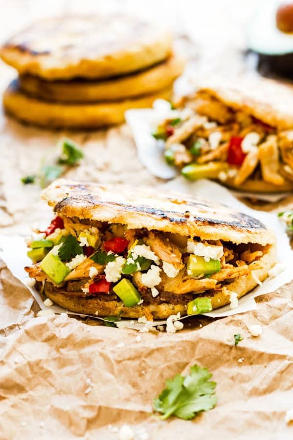 A gluten-free arepas recipe with chicken, avocado, and vegetables for dinner.
