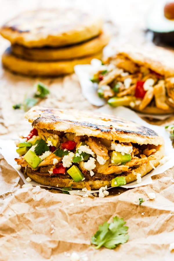 A gluten-free arepas recipe with chicken, avocado, and vegetables for dinner.