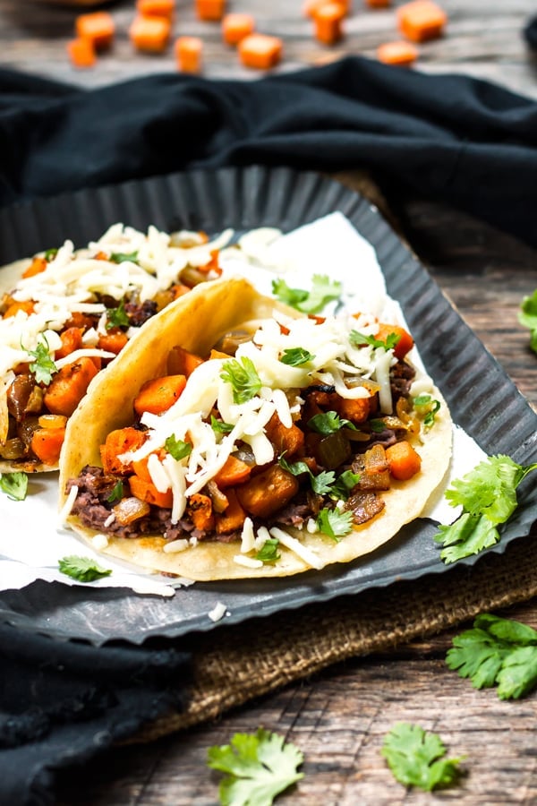 Gluten-free sweet potato tacos made with black beans for an easy lunch.