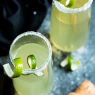 Two gluten-free champagne drinks filled with tequila for a delicious cocktail.
