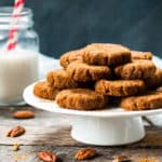 A collection of no-bake molasses cookie recipes on a cake plate ready to eat.