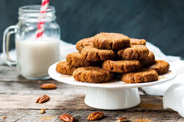 A collection of no-bake molasses cookie recipes on a cake plate ready to eat.