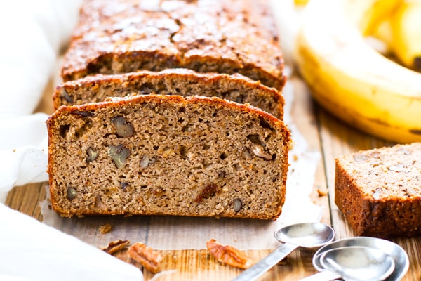 An almond flour banana bread recipe on parchment paper for a healthy breakfast.