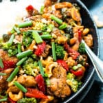 A bowl filled with a gluten-free cashew chicken recipe for a healthy dinner.