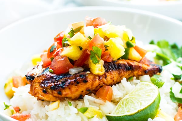 A gluten-free pineapple chicken recipe on rice for a healthy lunch.