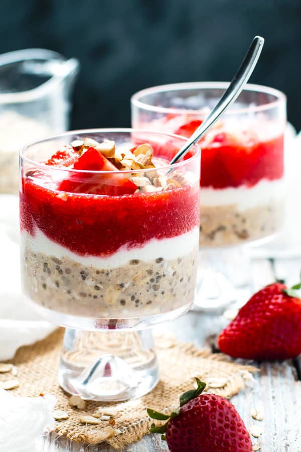 Strawberry shortcake overnight oats are a healthy, gluten-free, vegetarian, vegan and easy breakfast recipe for those weekdays that you are on-the-go! Each portion is full of fresh strawberries, yogurt, gluten-free oats, and chia seeds.