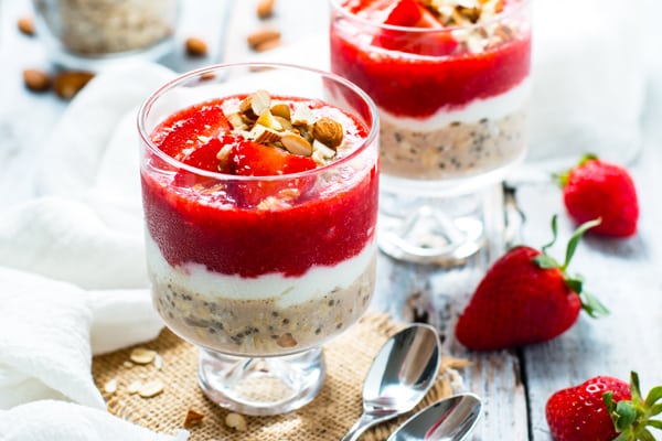 Two servings of strawberry oatmeal using overnight oats for a healthy breakfast.