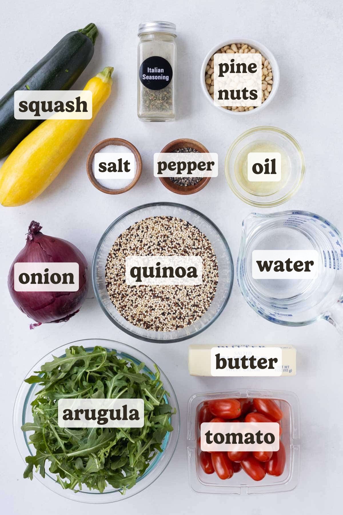 Quinoa, squash, tomato, arugula, onion, and seasonings are the main ingredients for this summer quinoa salad recipe.