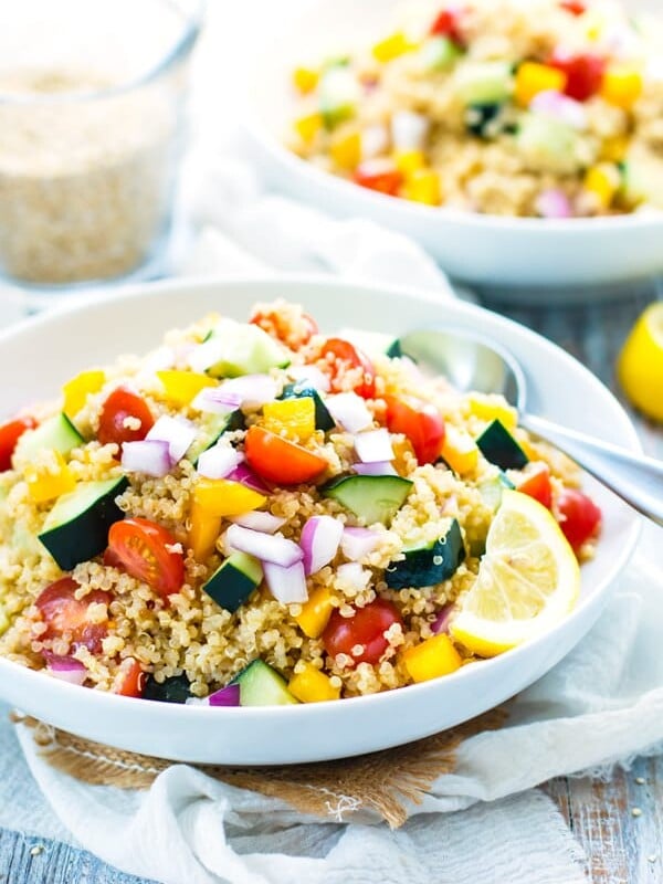 Gluten-free quinoa salad dressing with a summer vegetable quinoa salad for a healthy lunch.