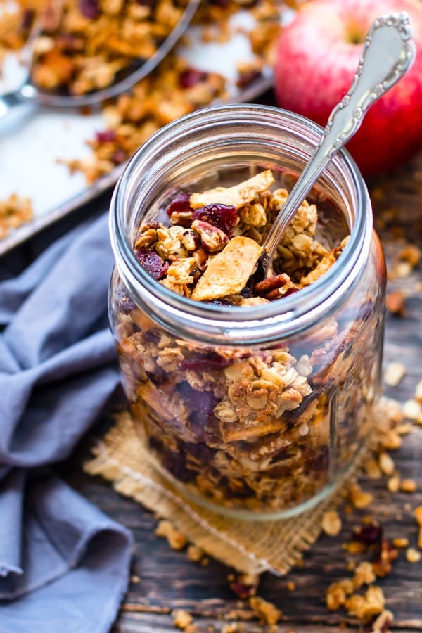 Get ready for your house to smell like Fall when you bake up this maple pecan apple cinnamon granola.  Gluten-free, vegan, vegetarian, dairy-free and SUPER addicting breakfast or snack recipe for the Fall season!!