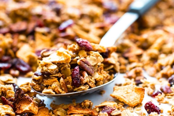 Get ready for your house to smell like Fall when you bake up this maple pecan apple cinnamon granola.  Gluten-free, vegan, vegetarian, dairy-free and SUPER addicting breakfast or snack recipe for the Fall season!!
