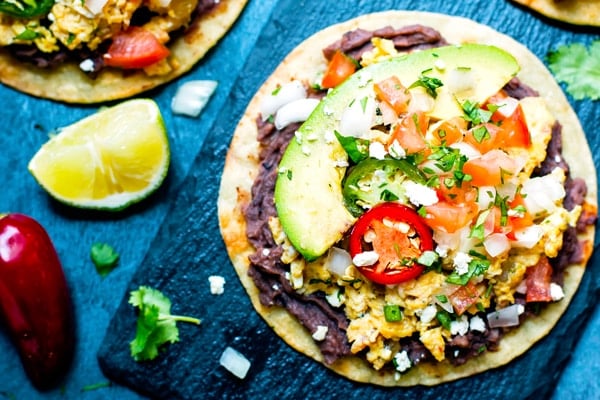 Gluten-free tostada recipe made with eggs and pico de gallo for a healthy lunch.