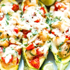 Zucchini boats stuffed with gluten-free cilantro lime chicken for a healthy meal.