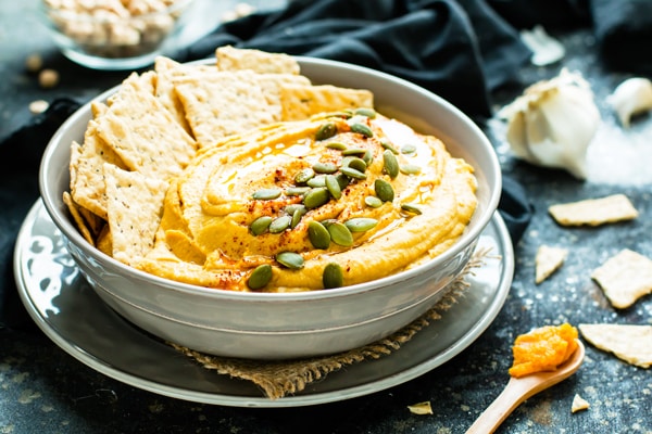 Pumpkin hummus recipe in a bowl for an easy appetizer.