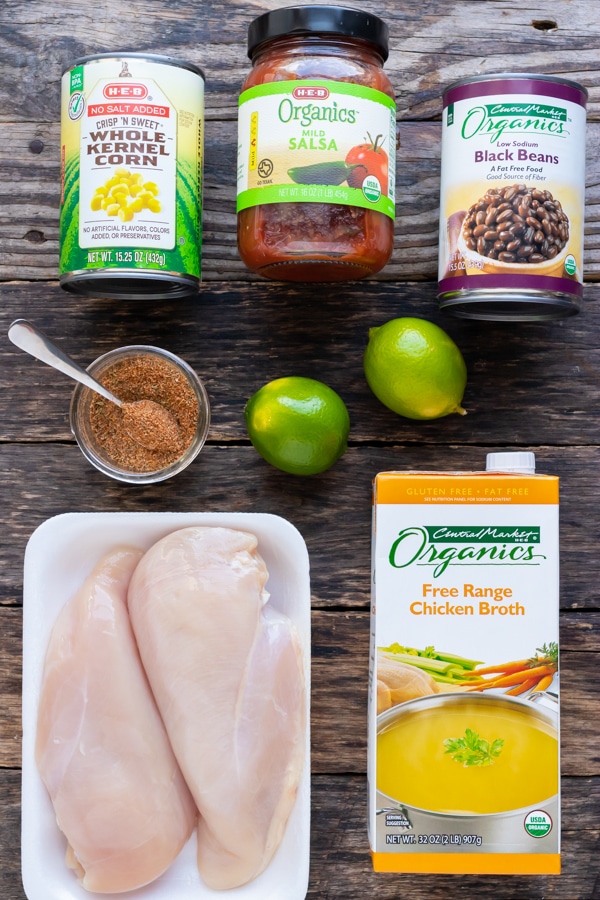 Ingredients for a healthy tortilla soup recipe with shredded chicken breasts.