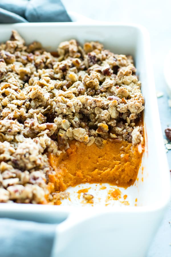 Healthy Sweet Potato Casserole is topped with a pecan and oat crumble for a lightened-up, gluten-free version of your favorite Thanksgiving Day casserole! This sweet potato casserole can also easily be made vegan.