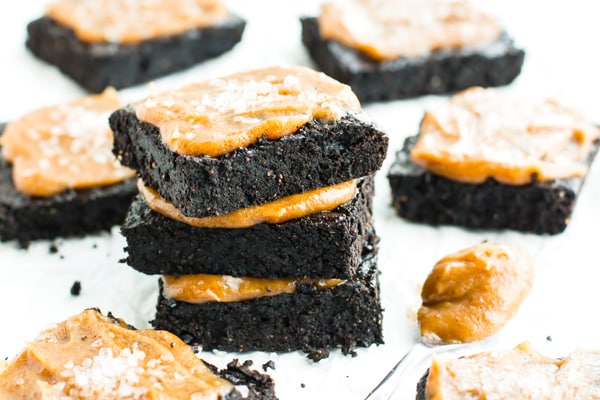 A stack of paleo brownies with salted caramel ready to eat for dessert.