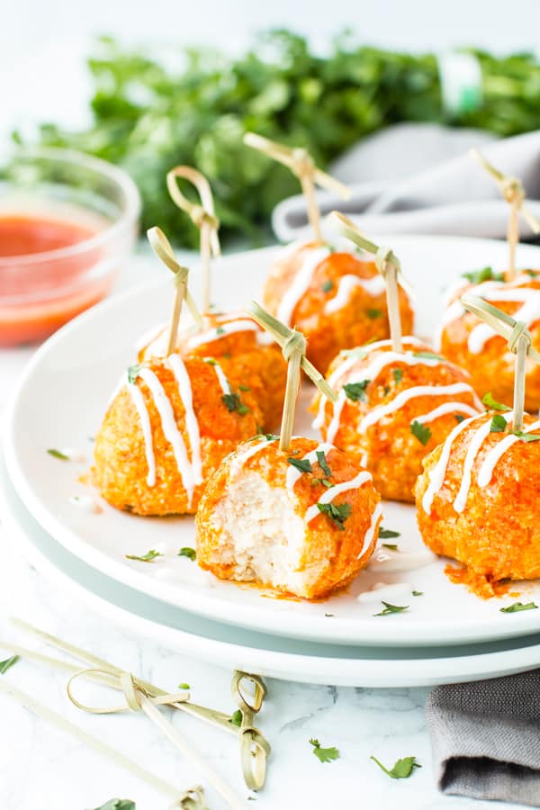 Slow Cooker Buffalo Chicken Meatballs are a super simple, easy, and low-carb appetizer recipe for game days, holiday get-togethers, or Super Bowl parties!  