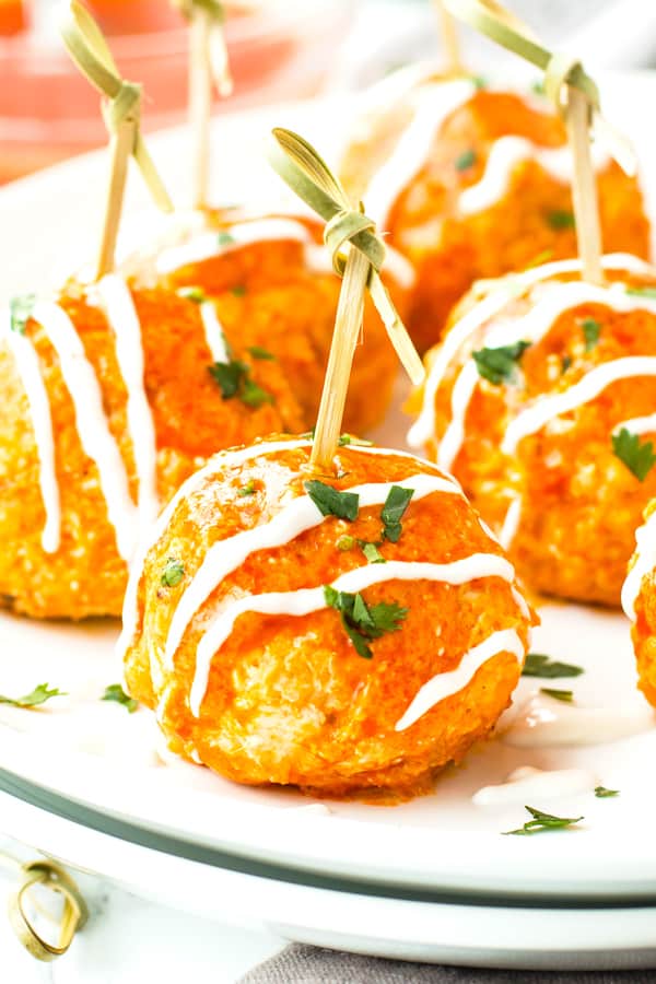 A close up picture of buffalo chicken meatballs made in the slow cooker for a party.