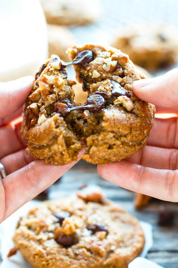 Breaking apart one Soft Paleo Chocolate Chip Cookie with Pecans for an afternoon treat.