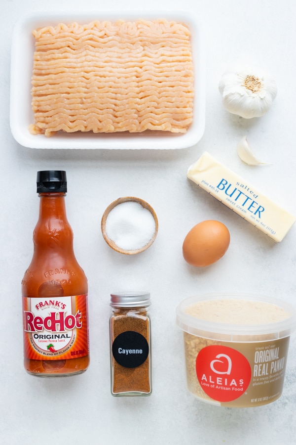 Ground chicken, Frank's RedHot sauce, breadcrumbs, butter, garlic, and an egg - the ingredients for a buffalo chicken meatballs recipe.