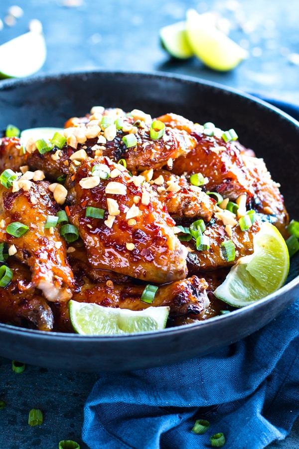 Thai chicken wings with a sweet sauce in a bowl for lunch.