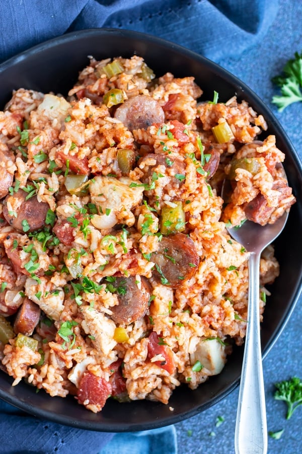 A quick and easy Cajun jambalaya recipe in a black bowl.