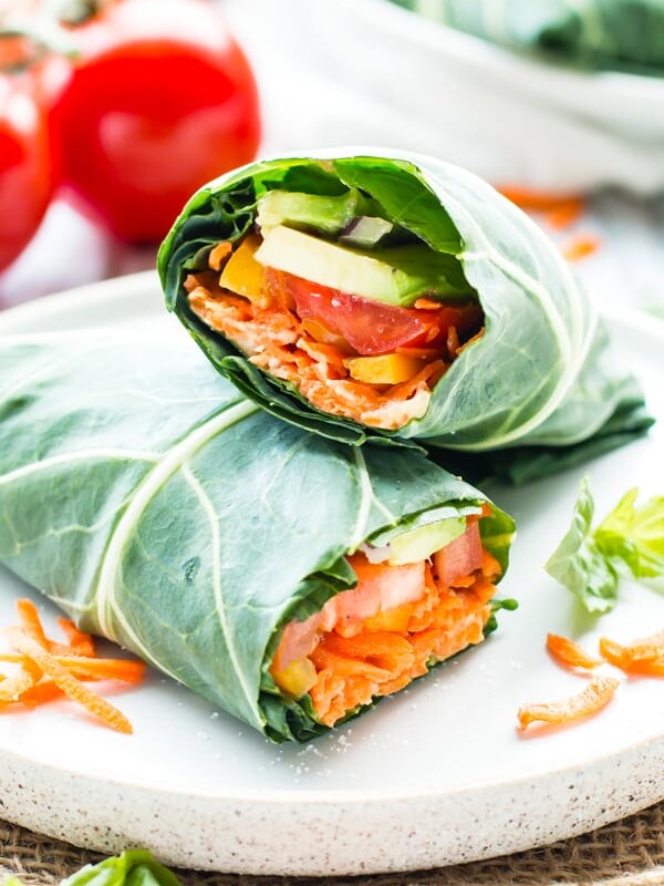 Vegetable hummus wraps on a plate ready to eat for an easy lunch.