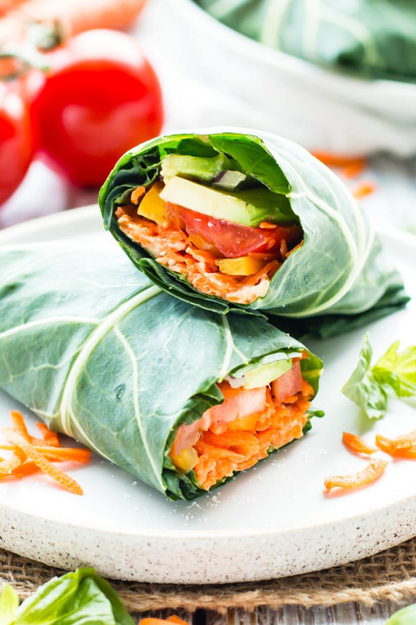 Vegetable hummus wraps on a plate ready to eat for an easy lunch.