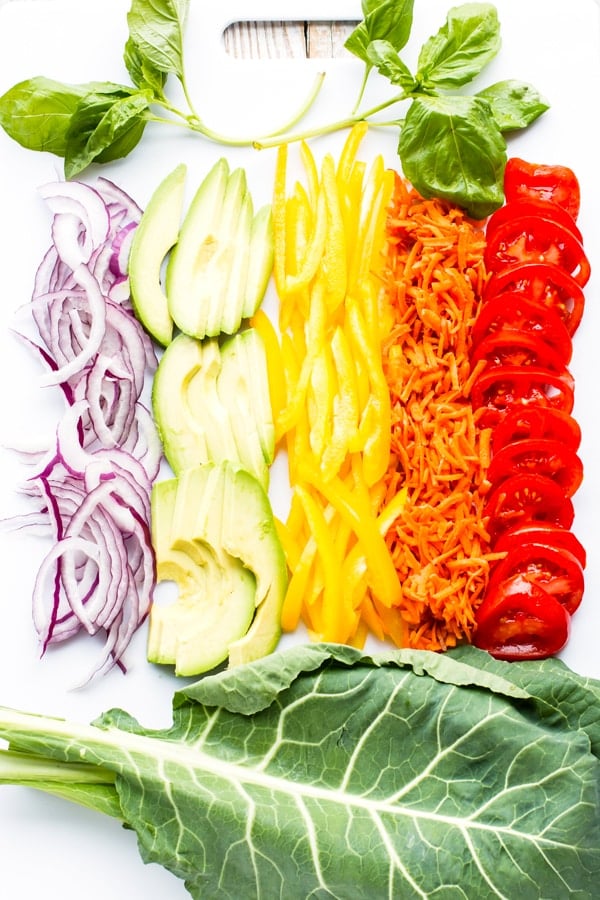 https://www.evolvingtable.com/wp-content/uploads/2018/01/Rainbow-Veggie-Wraps-2.jpg